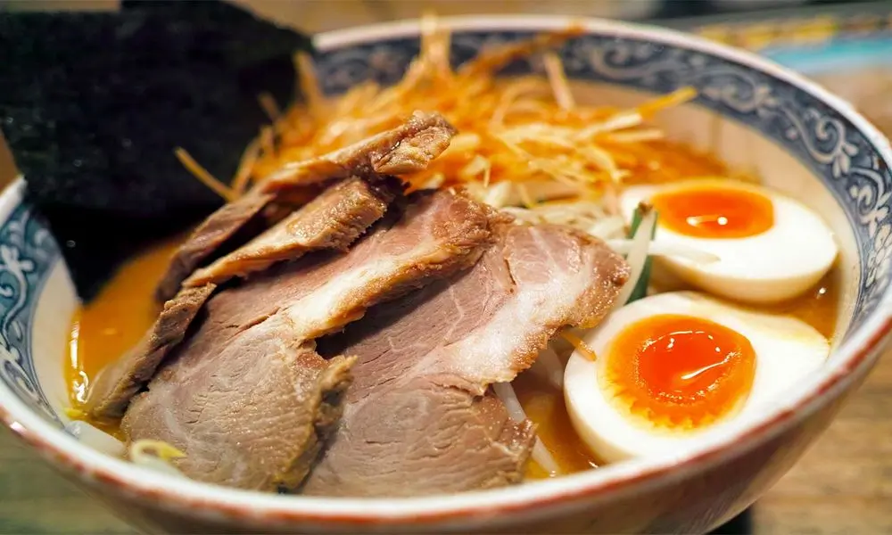 AURA-Restaurant-Asian-Restaurant-Ramen-Santa-Barbara Savory ramen with meat, egg and broth at AURA-Restaurant, a Asian Restaurant in Santa Barbara.